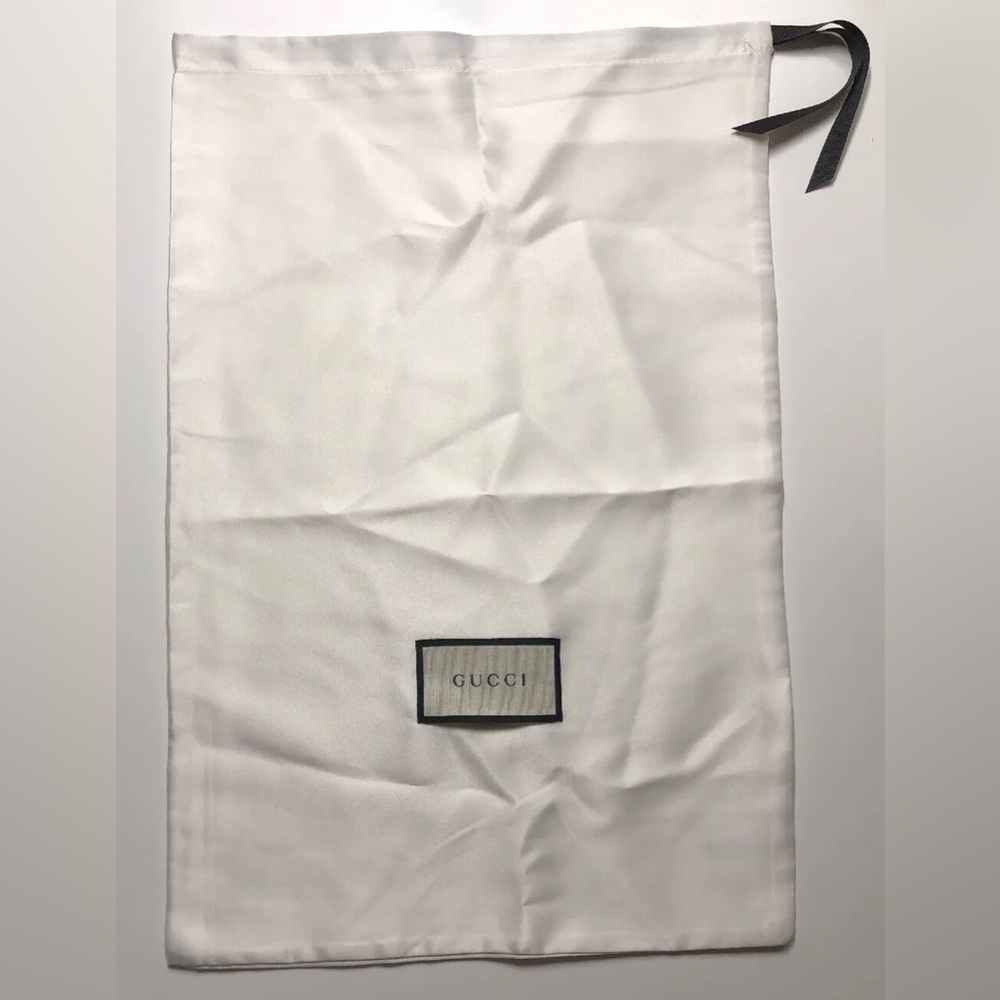 white Gucci dust bags